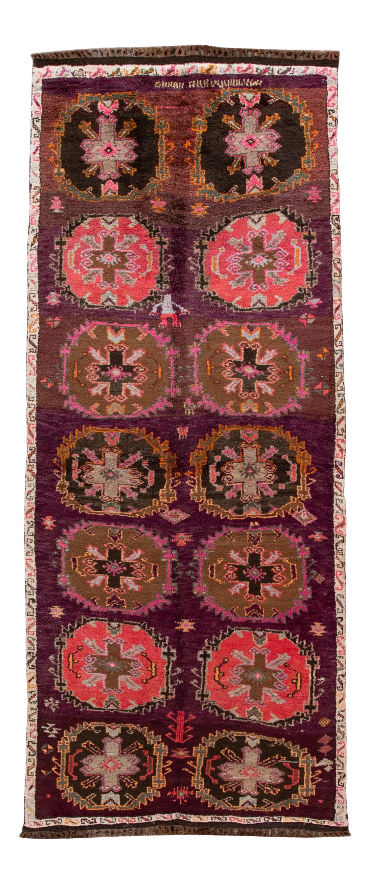Vintage Turkish Handmade Purple Wool Tribal Runner 4'10 x 12': Vintage Turkish Handmade Purple Wool Tribal Runner 4'10 x 12' This stunning mid-vintage Turkish handmade runner features a rich purple field, beautifully complemented by an ivory frame and vibrant mul
