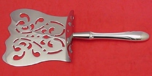 Towle Symphony Sterling Silver 10" Asparagus Server Custom Hollow Handle: Towle Symphony Sterling Silver 10" Asparagus Server Custom Hollow Handle Introducing the Symphony by Towle Sterling Silver Asparagus Server, a stunning addition to your serving collection. This custom