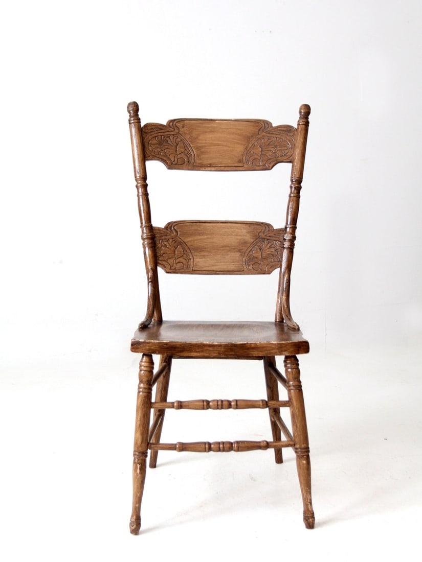 Vintage Antique Pressed Back Dining Chair Tall Design: Vintage Antique Pressed Back Dining Chair Tall Design This antique pressed back dining chair showcases a classic design with a tall silhouette and a decorative pressed pattern on its back rails. Craft