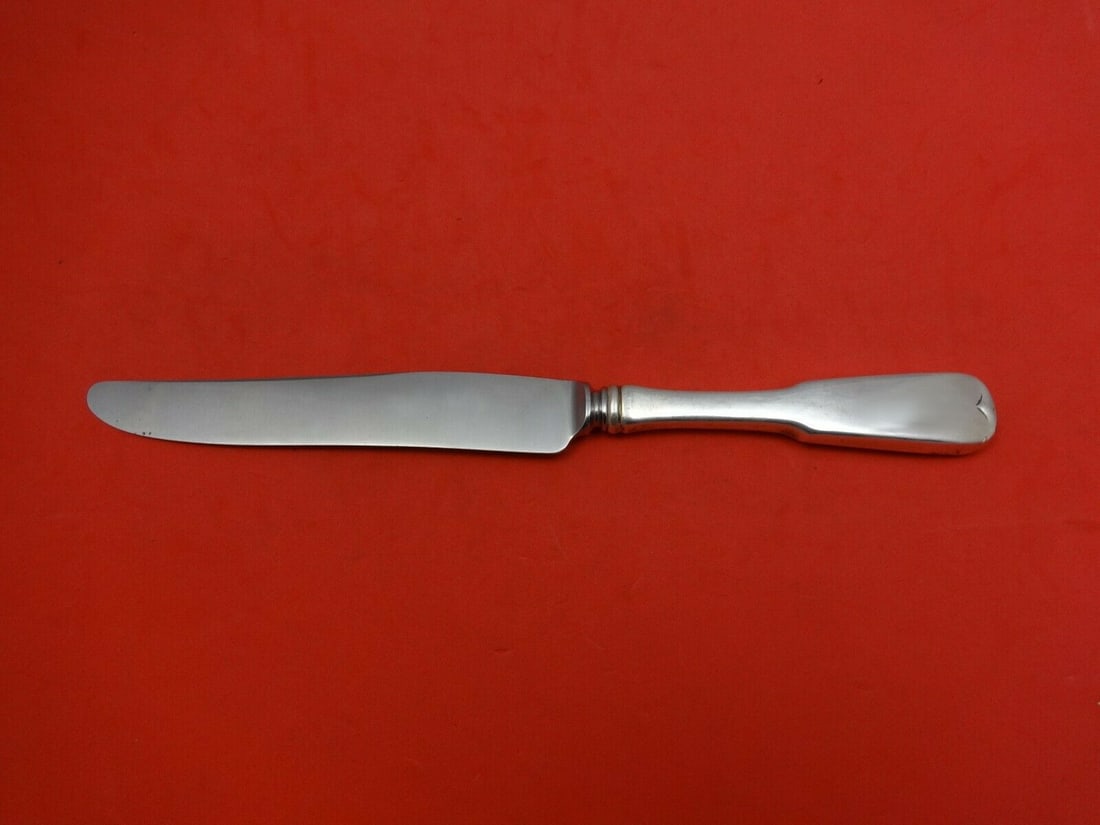 Old Newbury Crafters Sturbridge Sterling Silver Dinner Knife 9 7/8": Old Newbury Crafters Sturbridge Sterling Silver Dinner Knife 9 7/8" This exquisite dinner knife features a hollow handle crafted from sterling silver, complemented by a durable stainless steel blade.