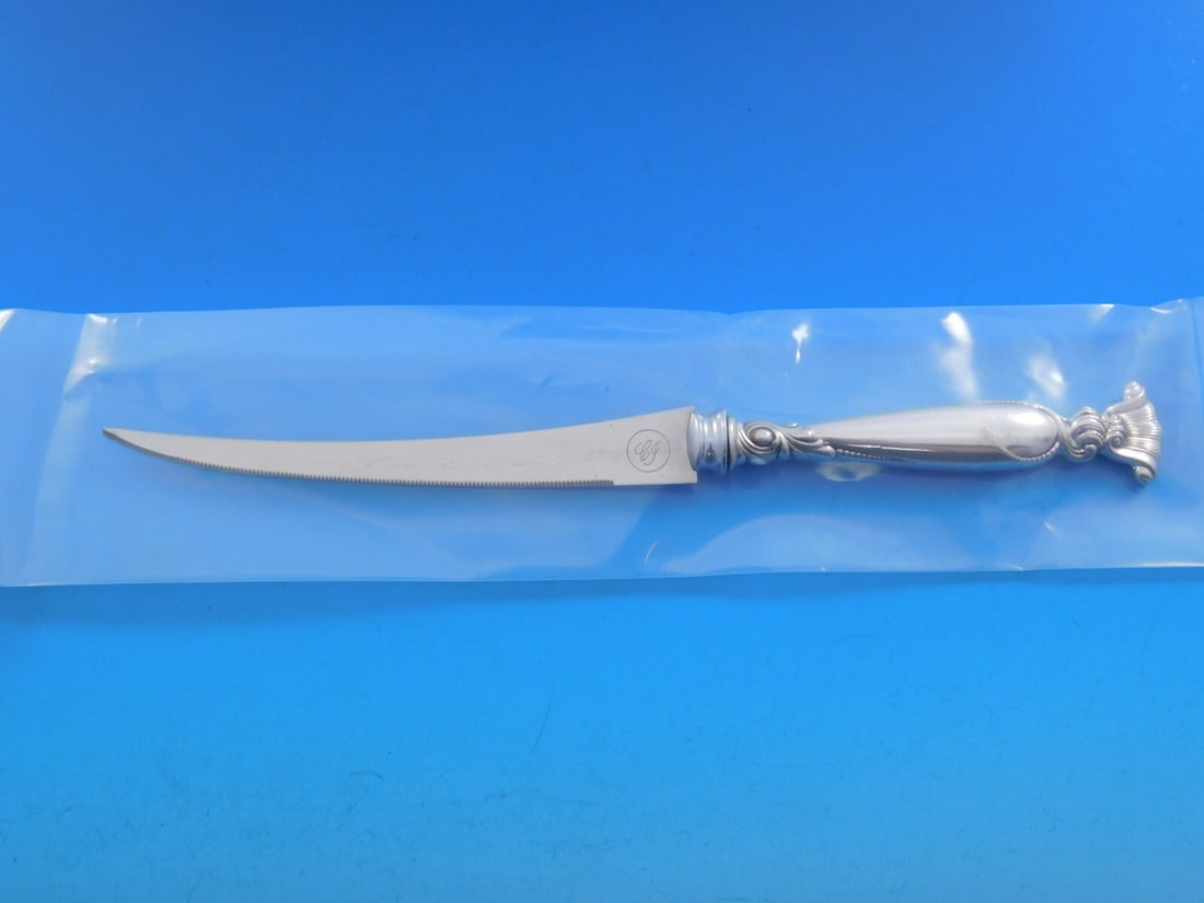 Wallace Romance of the Sea Sterling Silver Tomato Knife 7 7/8 Custom Made: Wallace Romance of the Sea Sterling Silver Tomato Knife 7 7/8 Custom Made This exquisite tomato knife features a stunning design from the 'Romance of the Sea' pattern by Wallace. Crafted with a sterli