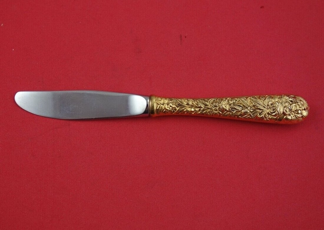 Kirk Repousse Vermeil Sterling Silver Butter Spreader 6 1/4 inches: Kirk Repousse Vermeil Sterling Silver Butter Spreader 6 1/4 inches This exquisite butter spreader features a hollow handle crafted from sterling silver and is adorned with a stunning repousse vermeil