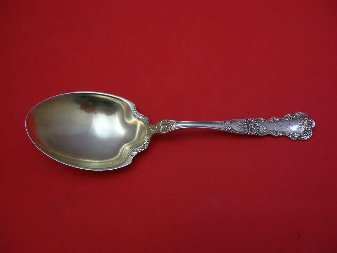Gorham Buttercup Sterling Silver Berry Spoon Gold Wash 8.5": Gorham Buttercup Sterling Silver Berry Spoon Gold Wash 8.5" This beautiful Buttercup serving spoon by Gorham is a stunning piece of history, crafted in sterling silver with a luxurious gold wash. Meas
