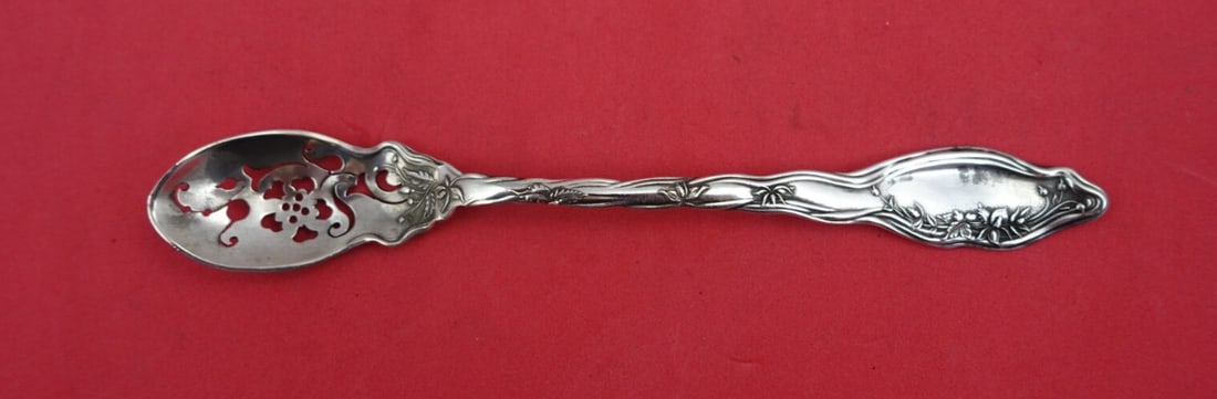 International Sterling Mille Fleurs Olive Spoon 5 7/8" Pierced: International Sterling Mille Fleurs Olive Spoon 5 7/8" Pierced This exquisite olive spoon features the Mille Fleurs pattern by International Sterling. Crafted from high-quality sterling silver, this p