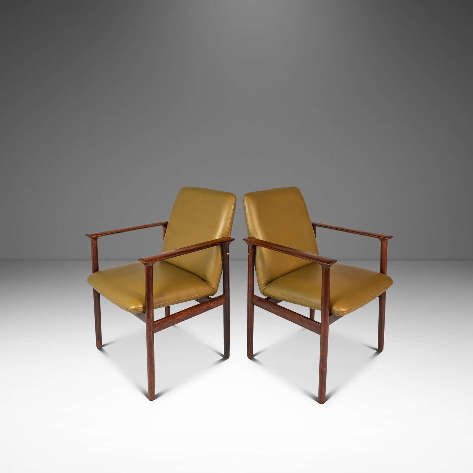 Pair of 1960s Rosewood and Leather Armchairs by De Klerk & Sons Netherlands: Pair of 1960s Rosewood and Leather Armchairs by De Klerk & Sons Netherlands This set of two rare mid-century Scandinavian modern arm chairs was crafted by De Klerk & Sons in the Netherlands during the