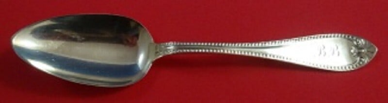 Vanderslice Beaded Sterling Silver Serving Spoon 8 3/8": Vanderslice Beaded Sterling Silver Serving Spoon 8 3/8" This exquisite serving spoon from Vanderslice features a classic beaded pattern and is crafted from high-quality sterling silver. Measuring 8 3/