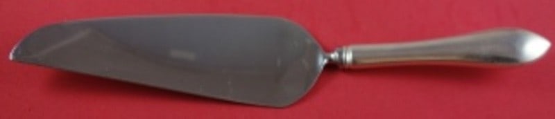 Sterling Silver Pointed Antique Pattern Pie Server with Hollow Handle 10 1/2 Inch: Sterling Silver Pointed Antique Pattern Pie Server with Hollow Handle 10 1/2 Inch This is a Pointed Antique pattern pie server made by Dominick & Haff. Crafted from sterling silver, it features a holl