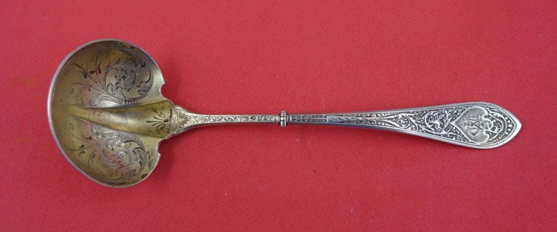 Gorham Raphael Sterling Silver Sauce Ladle Goldwashed 6.5": Gorham Raphael Sterling Silver Sauce Ladle Goldwashed 6.5" This exquisite sterling silver sauce ladle is crafted by Gorham in the elegant Raphael pattern. Measuring 6 1/2 inches, this ladle features a