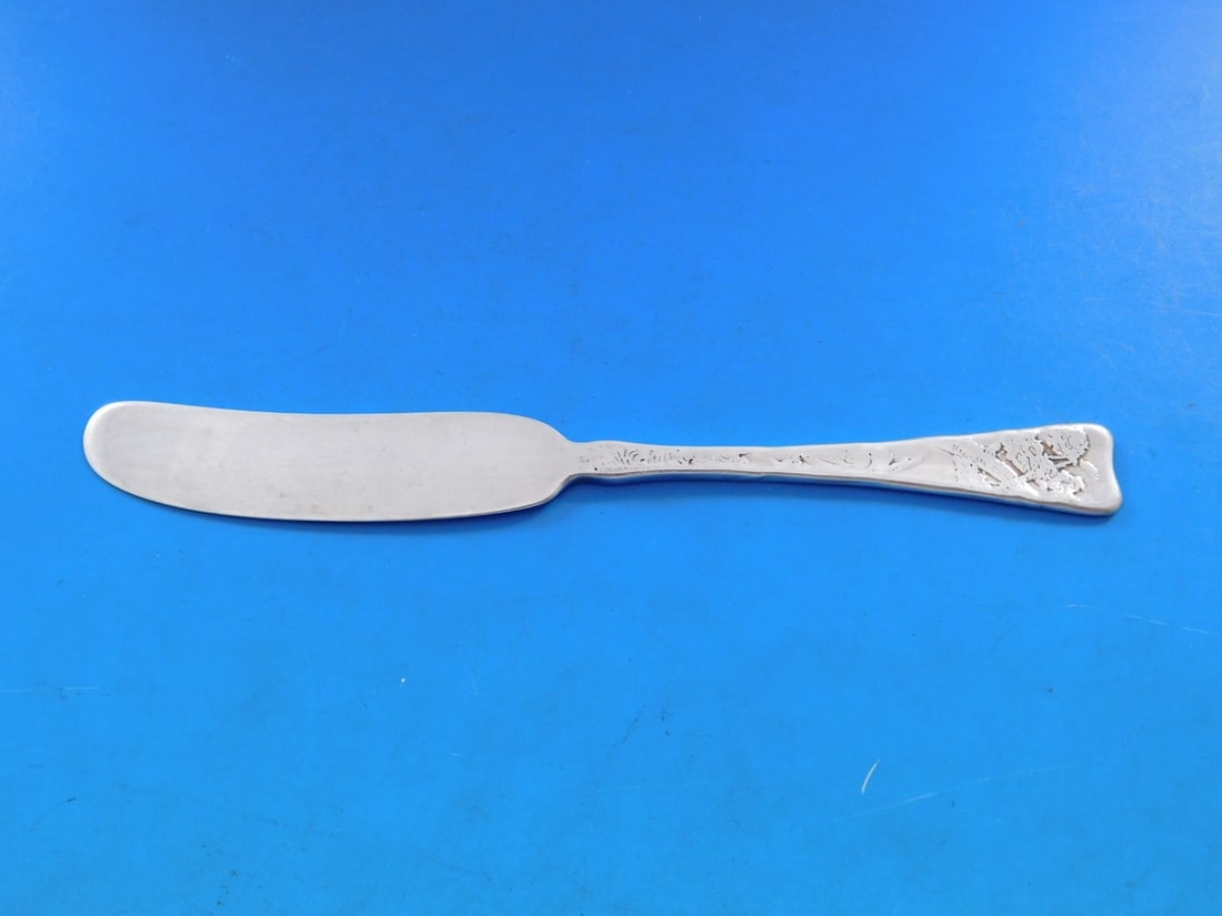 Tiffany Sterling Silver 6" Butter Spreader Lap Over Edge Acid Etched: Tiffany Sterling Silver 6" Butter Spreader Lap Over Edge Acid Etched This exquisite butter spreader features the Lap Over Edge Acid Etched pattern by Tiffany & Co., crafted from high-quality sterling
