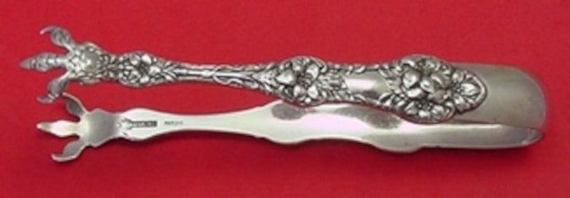 Sterling Silver Sugar Tong Old Orange Blossom Pattern by Alvin or Gorham 4.75 Inch: Sterling Silver Sugar Tong Old Orange Blossom Pattern by Alvin or Gorham 4.75 Inch This is a sterling silver sugar tong crafted by Alvin / Gorham in the Old Orange Blossom pattern. Measuring 4 3/4 inc
