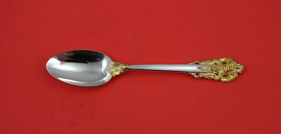 Wallace Grande Baroque Gold Accents Sterling Silver Soup Spoon 7": Wallace Grande Baroque Gold Accents Sterling Silver Soup Spoon 7" Elevate your dining experience with this exquisite 7" place soup spoon from the Grande Baroque Gold Accents pattern by Wallace. Crafte
