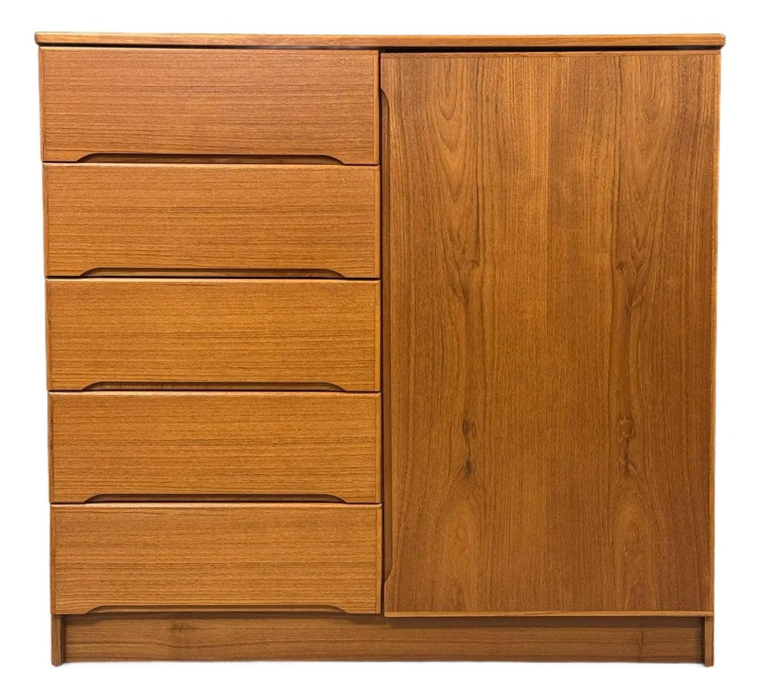 1970s Danish Modern Teak Armoire with Adjustable Shelving: 1970s Danish Modern Teak Armoire with Adjustable Shelving This stunning 1970s Danish Modern teak armoire features a swinging door and adjustable shelving, making it both a functional and stylish addit