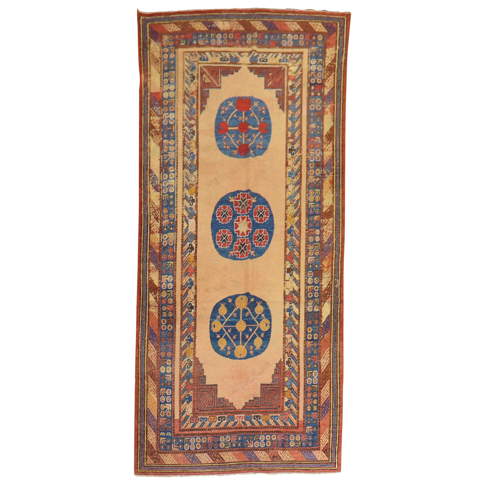 19th Century Khotan Rug Hand-Woven Wool East Turkestan 68 x 155 in: 19th Century Khotan Rug Hand-Woven Wool East Turkestan 68 x 155 in Discover this exquisite 19th Century Antique East Turkestan Khotan Rug, a stunning piece that showcases the rich tradition of hand-wo