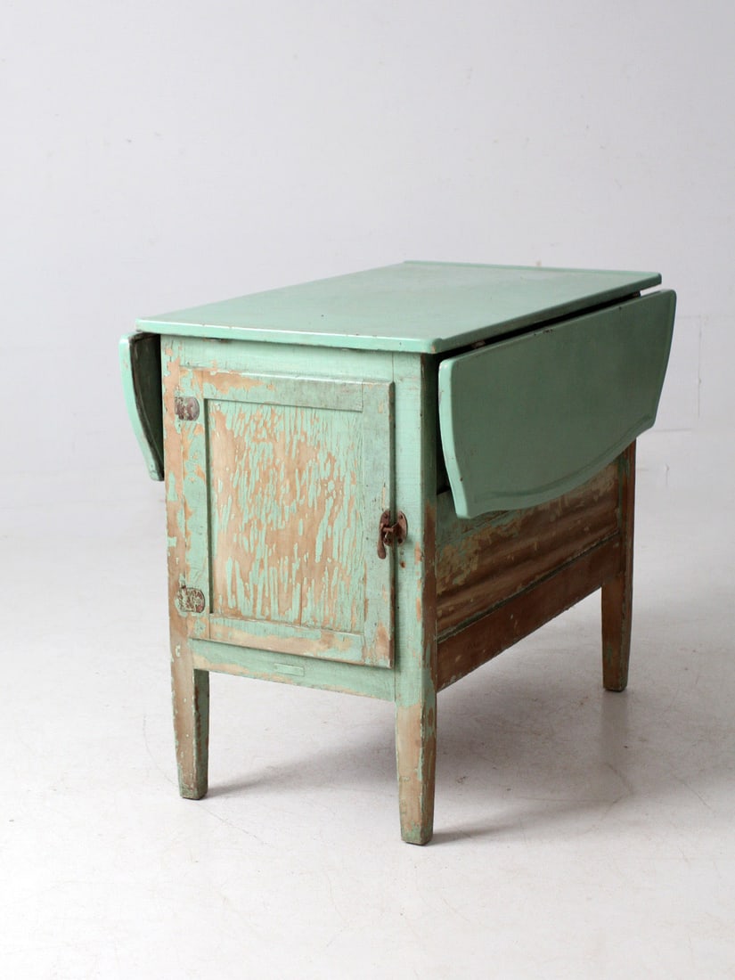 Rare Antique Hoosier Kitchen Table with Enamel Drop-Leaf Top: Rare Antique Hoosier Kitchen Table with Enamel Drop-Leaf Top This early 20th-century Antique Enamel-Top Hoosier Kitchen Work Table is a remarkable piece that showcases the practical design of Hoosier-