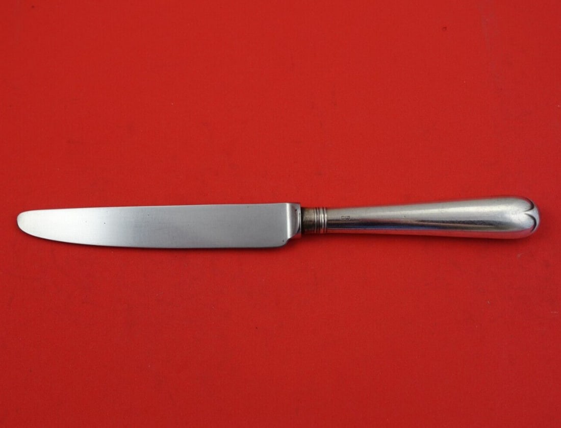 Strickett & Loder Old English Sterling Silver Luncheon Knife 8 5/8": Strickett & Loder Old English Sterling Silver Luncheon Knife 8 5/8" This exquisite Old English knife by Strickett & Loder showcases timeless elegance and craftsmanship. Made from sterling silver, the