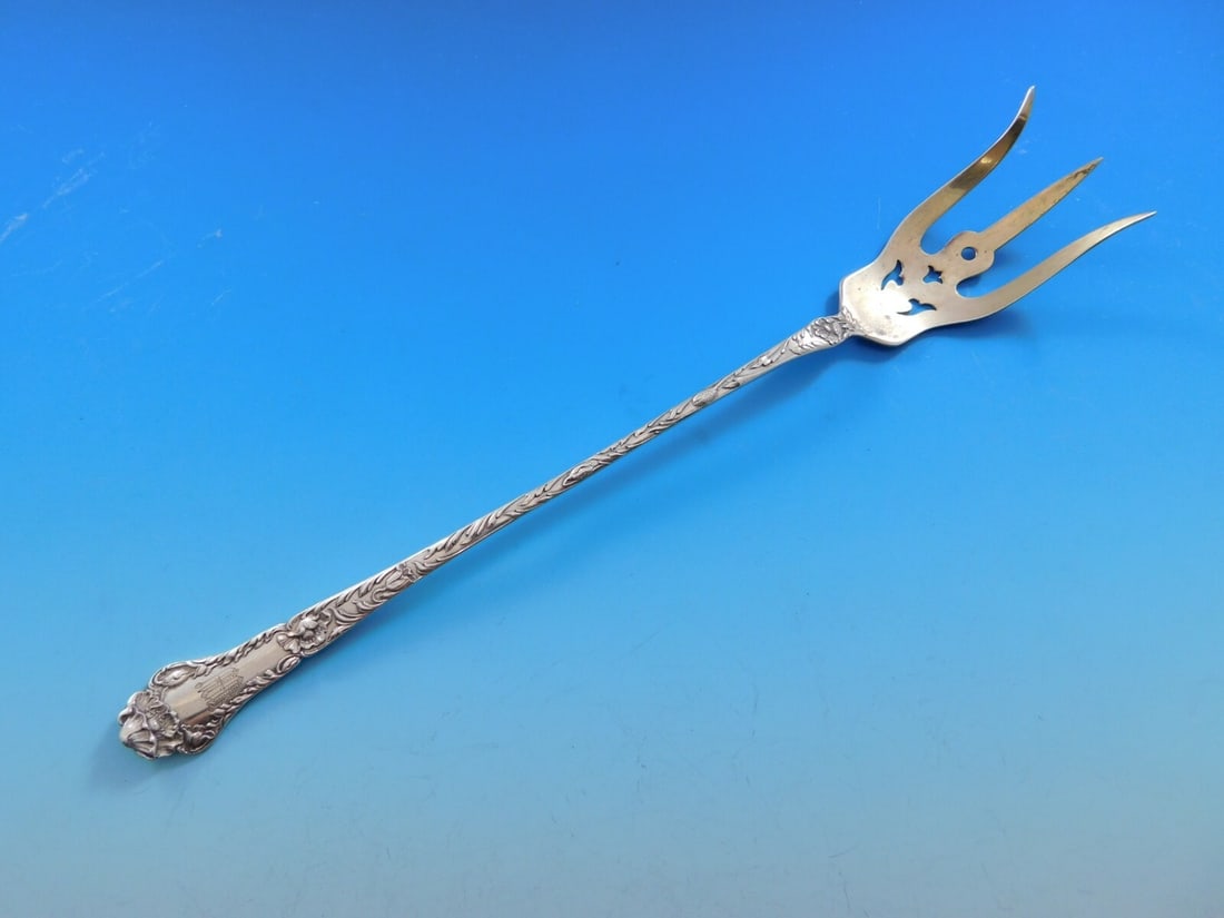 Gorham Poppy Sterling Silver Lettuce Fork 9 Gold Wash Monogrammed: Gorham Poppy Sterling Silver Lettuce Fork 9 Gold Wash Monogrammed Enhance your dining experience with the exquisite Poppy by Gorham Sterling Silver Lettuce Fork. This elegant serving fork features a s