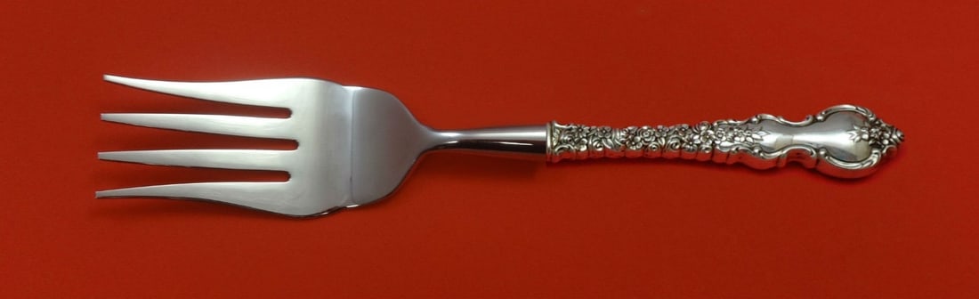 Towle Debussy Sterling Silver Custom Serving Fork 8.5": Towle Debussy Sterling Silver Custom Serving Fork 8.5" This exquisite serving fork is custom made in the elegant Debussy pattern by Towle. Crafted from sterling silver, it features a hollow handle wit
