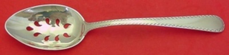 Sterling Silver Winslow Pattern Pierced Serving Spoon by Kirk 8 1/8 Inch: Sterling Silver Winslow Pattern Pierced Serving Spoon by Kirk 8 1/8 Inch This is a pierced serving spoon in the Winslow pattern by Kirk, crafted from sterling silver (.925). The spoon features a 9-hol
