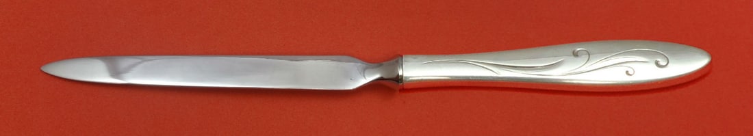 Towle Sterling Silver Awakening Letter Opener Custom Made 8": Towle Sterling Silver Awakening Letter Opener Custom Made 8" This exquisite letter opener from Towle features a stunning "Awakening" pattern, crafted from sterling silver with a hollow handle and a st