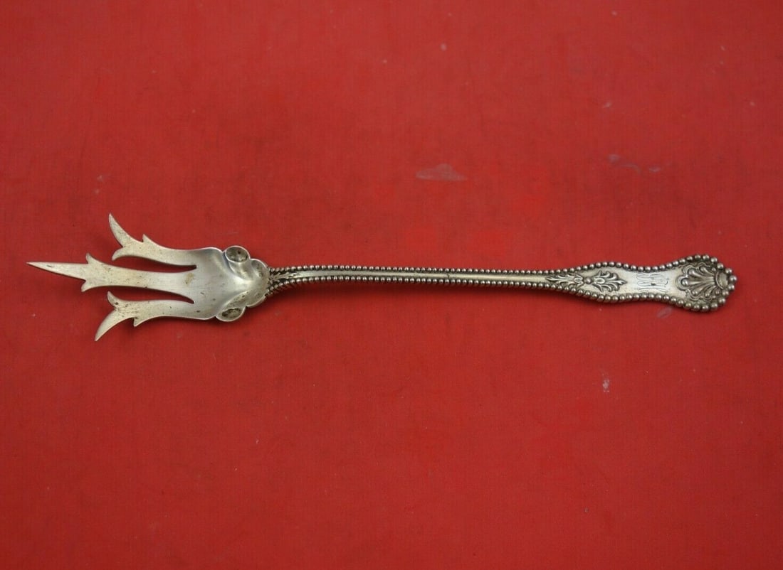 Dominick & Haff Charles II Sterling Silver Lettuce Fork 8 Inch: Dominick & Haff Charles II Sterling Silver Lettuce Fork 8 Inch This exquisite 8" serving fork is crafted from sterling silver by Dominick & Haff, showcasing the elegant Charles II pattern. Dating back