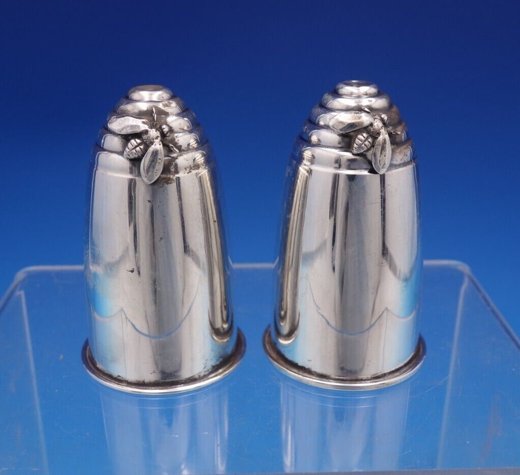 Gorham Sterling Silver 2pc Beehive Salt Pepper Shakers with Bee: Gorham Sterling Silver 2pc Beehive Salt Pepper Shakers with Bee Discover the elegance of this Gorham Sterling Silver Salt and Pepper Shaker Set, featuring a charming beehive design accented with a thr