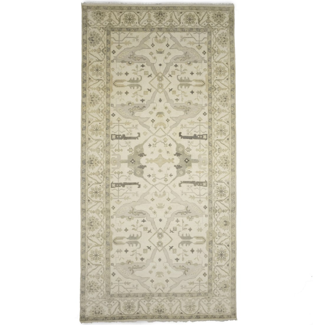 Hand-Knotted Wool Oushak Rug 8'1 x 16'2 Floral Pattern Modern Hallway Carpet: Hand-Knotted Wool Oushak Rug 8'1 x 16'2 Floral Pattern Modern Hallway Carpet This handmade Oushak oriental rug features a floral design in muted cream, beige, and taupe tones. Expertly hand-knotted fr