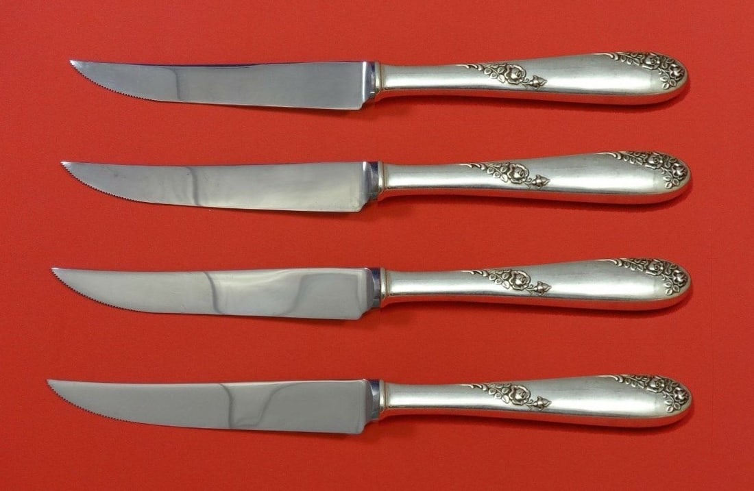 Lunt Sweetheart Rose Sterling Silver Steak Knife Set 4pc 8.5in Custom: Lunt Sweetheart Rose Sterling Silver Steak Knife Set 4pc 8.5in Custom Enhance your dining experience with this exquisite 4-piece steak knife set from Lunt, featuring the elegant Sweetheart Rose patter