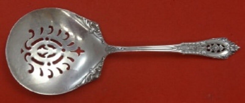 Wallace Rose Point Sterling Silver Tomato Server Extra Piercing 7 5/8": Wallace Rose Point Sterling Silver Tomato Server Extra Piercing 7 5/8" Introducing a stunning Tomato Server from the Rose Point pattern by Wallace, crafted from high-quality sterling silver. This exqu