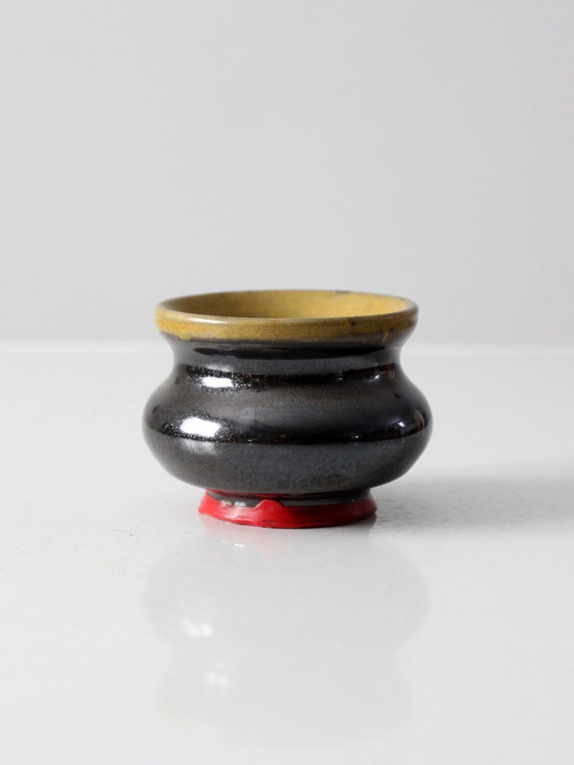 Rounded Black Glazed Studio Pottery Vase With Ochre Interior (1 of 7)