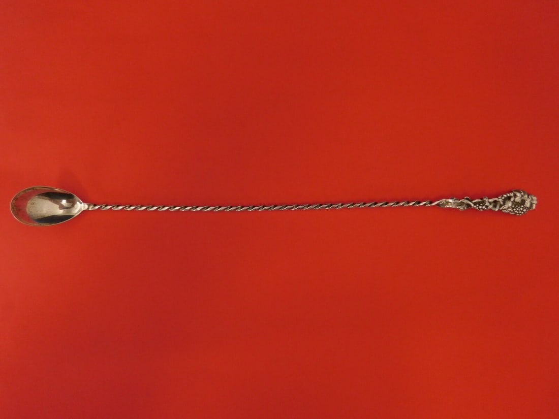 Dominick & Haff Sterling Silver Claret Ladle 16 Inch Grape Design: Dominick & Haff Sterling Silver Claret Ladle 16 Inch Grape Design Elevate your dining experience with this exquisite Sterling Silver Claret Ladle from Dominick and Haff. Featuring a beautifully twiste