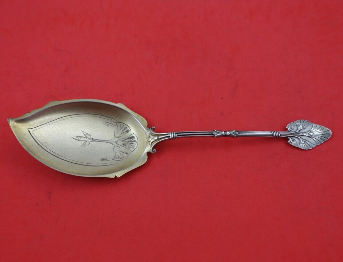 Gorham Lotus Sterling Silver Ice Cream Server 10 Inch Bright-Cut Blade: Gorham Lotus Sterling Silver Ice Cream Server 10 Inch Bright-Cut Blade This exquisite 10" ice cream server is crafted from sterling silver and features the elegant Lotus pattern by Gorham. The blade i
