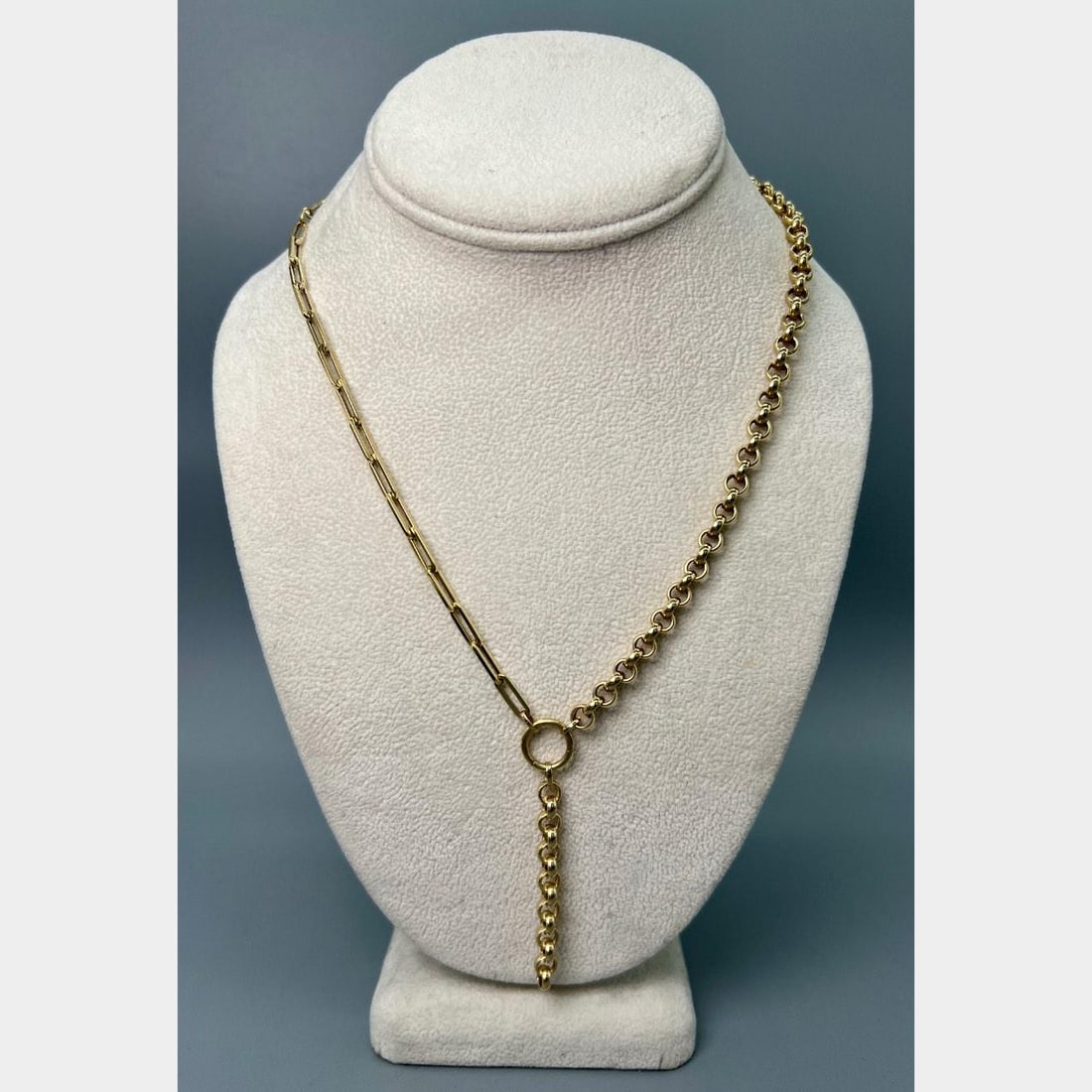 18 Inch 14K Yellow Gold Necklace Weighs 12.1 Grams: 18 Inch 14K Yellow Gold Necklace Weighs 12.1 Grams This 14K yellow gold two-style necklace features a distinctive design and weighs 12.1 grams. The necklace measures 18 inches in length and is in pre-
