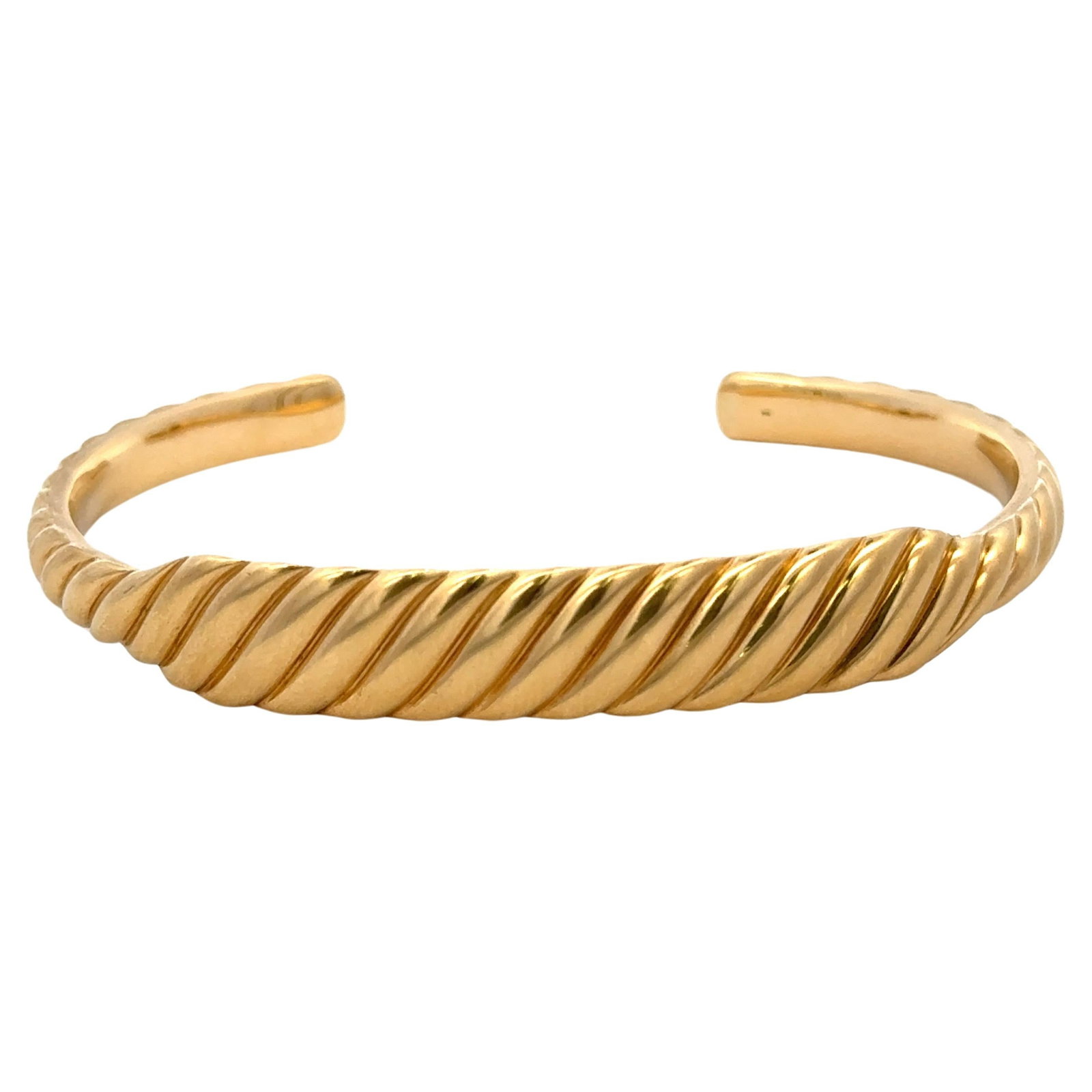 18k Yellow Gold David Yurman Sculpted Cable Cuff Bracelet 18.2g: 18k Yellow Gold David Yurman Sculpted Cable Cuff Bracelet 18.2g This David Yurman Sculpted Cable Contour Cuff Bracelet from the Cable Collection is crafted in 18 karat yellow gold and weighs 18.2 gram