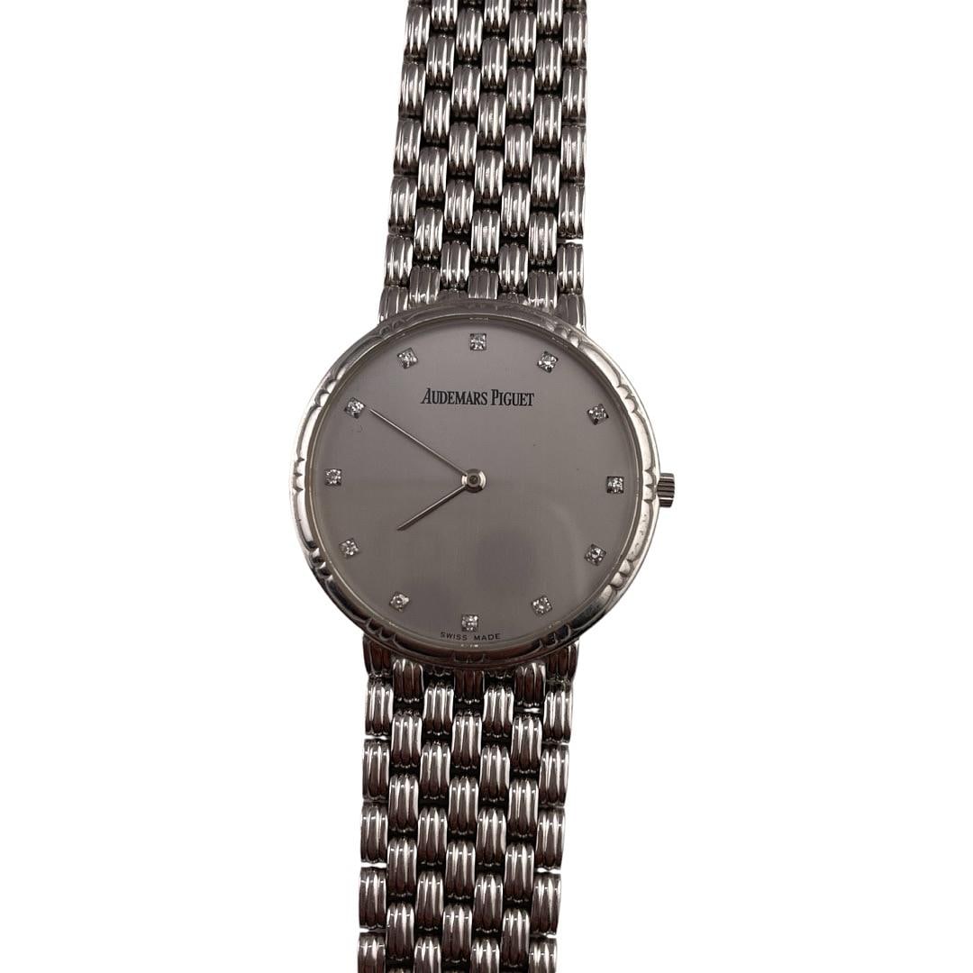 31mm 18K White Gold Silver Dial Audemars Piguet Watch: 31mm 18K White Gold Silver Dial Audemars Piguet Watch This Audemars Piguet watch features a silver dial and is crafted from 18K white gold. It measures 31mm in size and is presented in very good condi