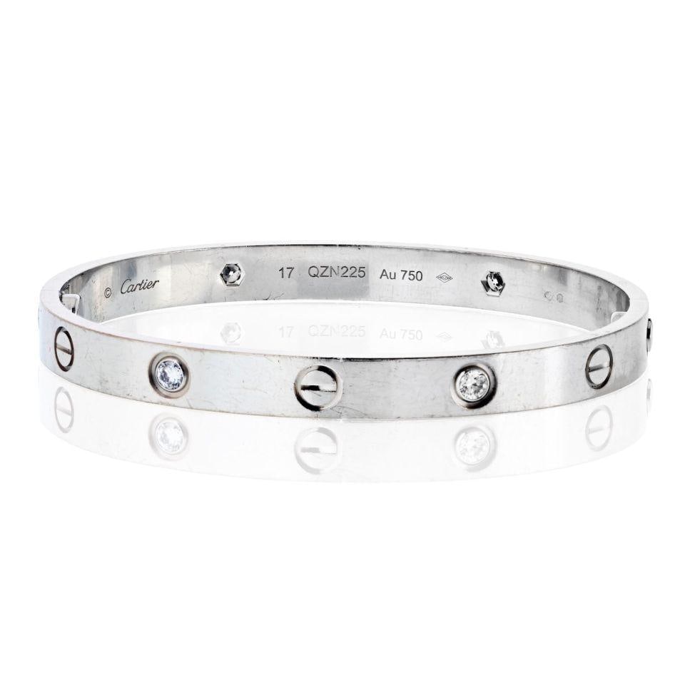 Cartier Love Bracelet 18K White Gold 4 Diamonds with Box and Papers: Cartier Love Bracelet 18K White Gold 4 Diamonds with Box and Papers Presenting the exquisite Cartier Love Bracelet crafted from 18K white gold, featuring four sparkling diamonds. This elegant piece we