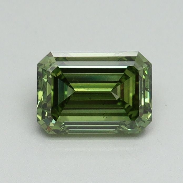Loose Diamond - EMERALD 0.71ct Fancy Vivid Green VS2: Loose Diamond - EMERALD 0.71ct Fancy Vivid Green VS2 Source: This is a real non-mined Diamond that has been grown in a lab Shape: EMERALD Carats: 0.71 Color: Fancy Vivid Green Certification: IGI Video
