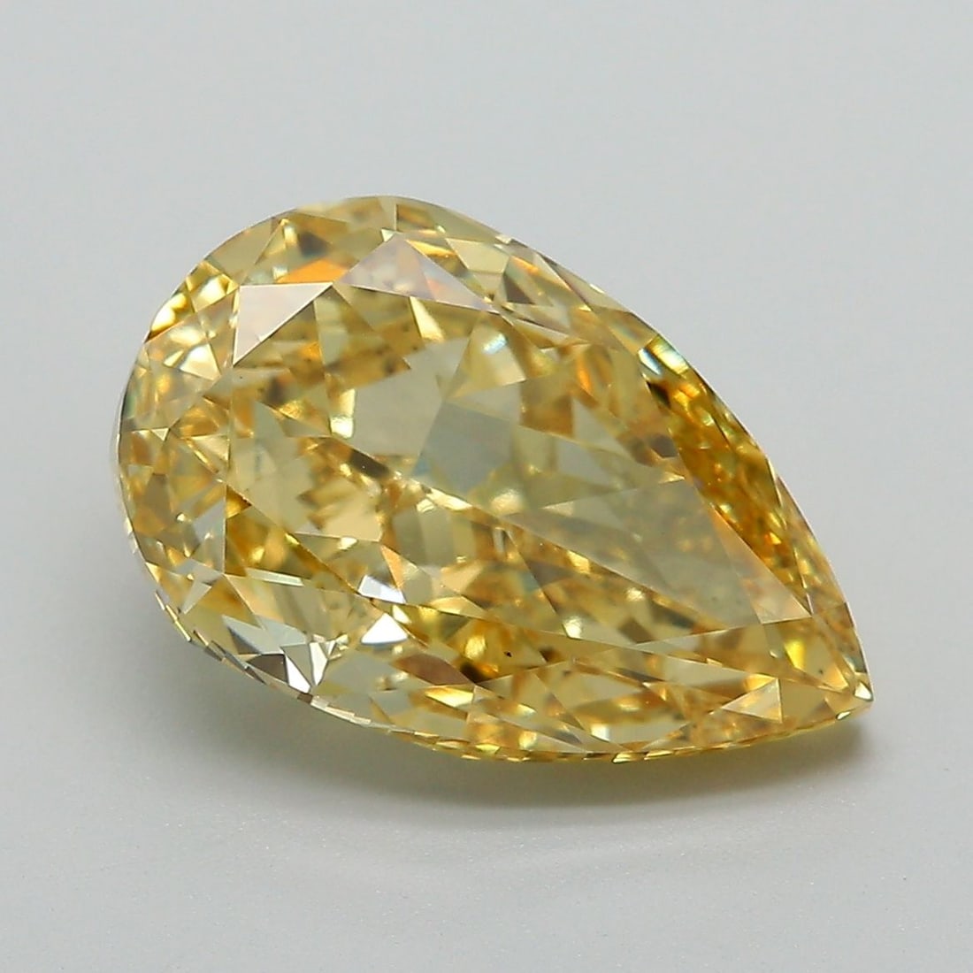 Loose Diamond - PEAR 5.04ct Fancy Vivid Yellow VS1: Loose Diamond - PEAR 5.04ct Fancy Vivid Yellow VS1 Source: This is a real non-mined Diamond that has been grown in a lab Shape: PEAR Carats: 5.04 Color: Fancy Vivid Yellow Certification: IGI Video: