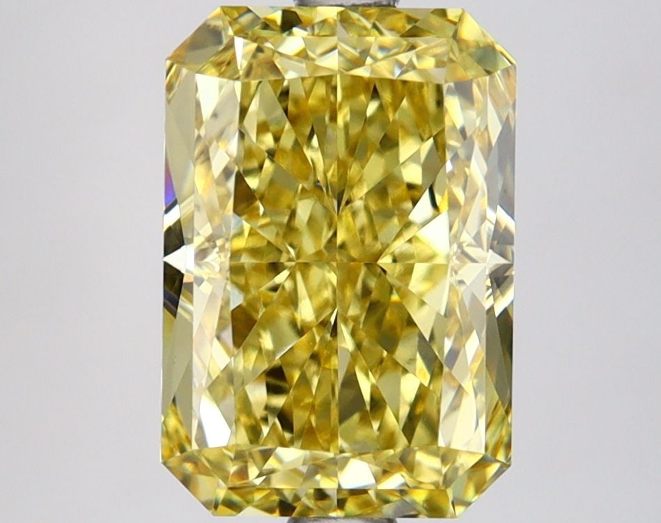 Loose Diamond - RADIANT 3.17ct Fancy Vivid Yellow VS1: Loose Diamond - RADIANT 3.17ct Fancy Vivid Yellow VS1 Source: This is a real non-mined Diamond that has been grown in a lab Shape: RADIANT Carats: 3.17 Color: Fancy Vivid Yellow Certification: IGI Vid