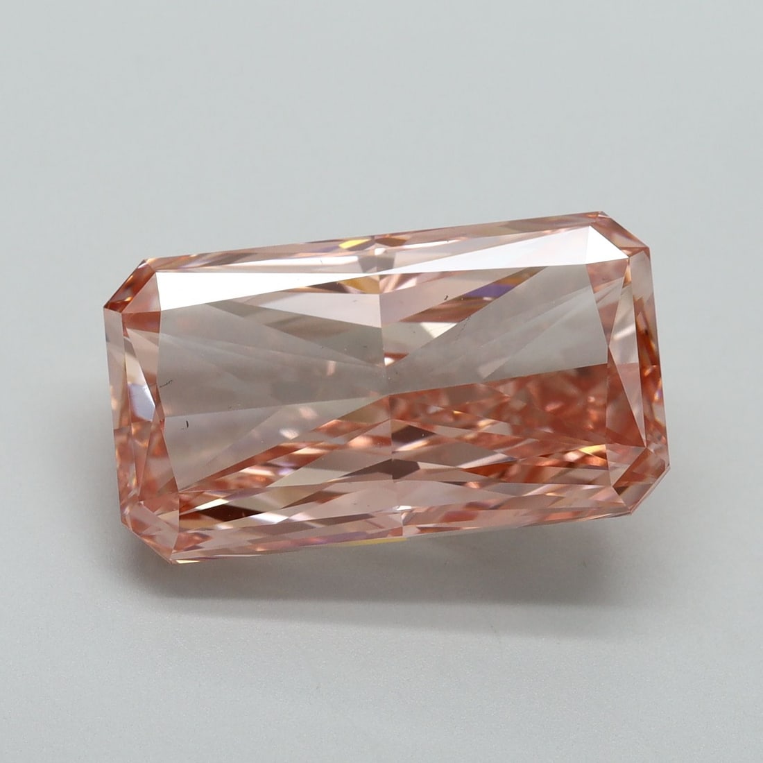Loose Diamond - RADIANT 10.05ct Fancy Vivid Pink VS2: Loose Diamond - RADIANT 10.05ct Fancy Vivid Pink VS2 Source: This is a real non-mined Diamond that has been grown in a lab Shape: RADIANT Carats: 10.05 Color: Fancy Vivid Pink Certification: IGI Video
