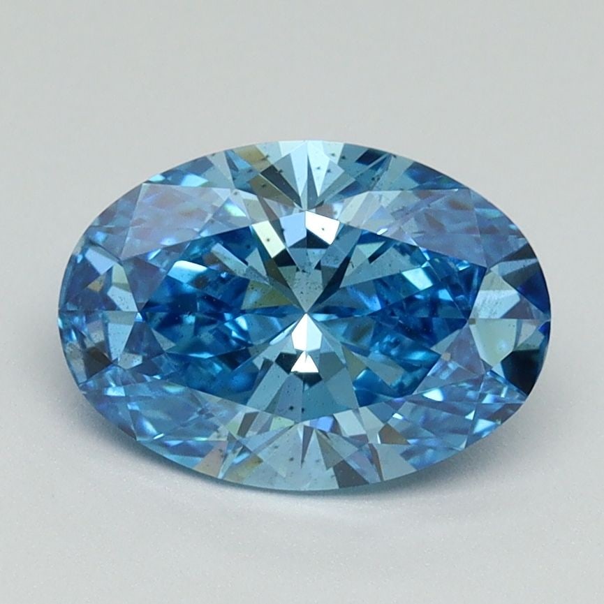 Loose Diamond - OVAL 1.62ct Fancy Vivid Blue SI1: Loose Diamond - OVAL 1.62ct Fancy Vivid Blue SI1 Source: This is a real non-mined Diamond that has been grown in a lab Shape: OVAL Carats: 1.62 Color: Fancy Vivid Blue Certification: IGI Video:
