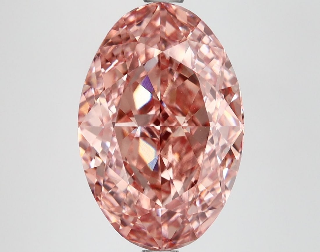 Loose Diamond - OVAL 5.07ct Fancy Vivid Pink VVS2: Loose Diamond - OVAL 5.07ct Fancy Vivid Pink VVS2 Source: This is a real non-mined Diamond that has been grown in a lab Shape: OVAL Carats: 5.07 Color: Fancy Vivid Pink Certification: IGI Video: