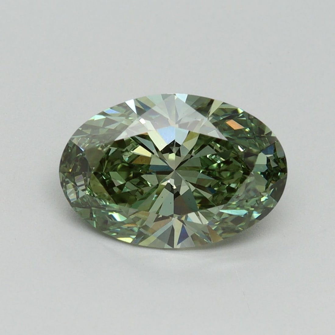 Loose Diamond - OVAL 2.13ct Fancy Vivid Green VS1: Loose Diamond - OVAL 2.13ct Fancy Vivid Green VS1 Source: This is a real non-mined Diamond that has been grown in a lab Shape: OVAL Carats: 2.13 Color: Fancy Vivid Green Certification: IGI Video: