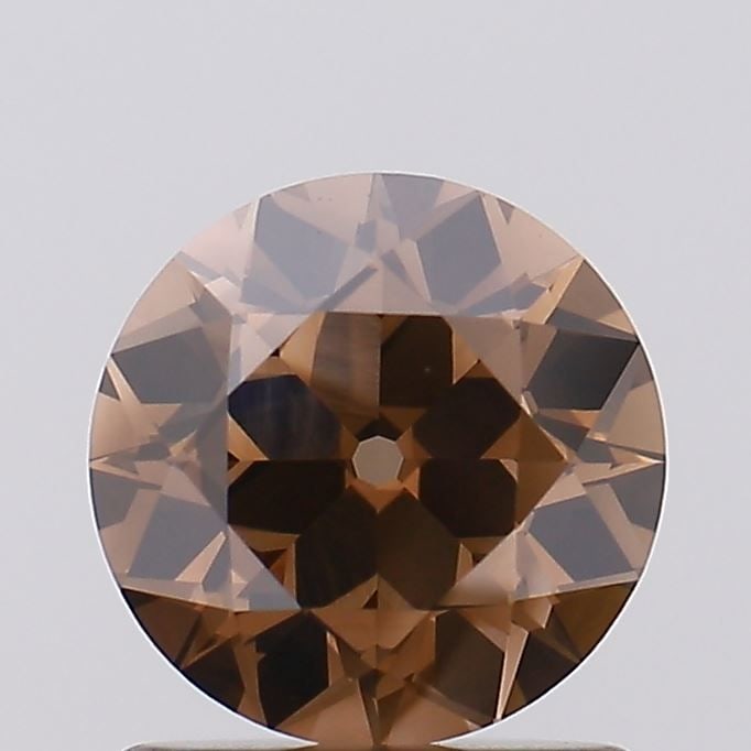 Loose Diamond - ROUND 1.16ct Fancy Brown VVS2: Loose Diamond - ROUND 1.16ct Fancy Brown VVS2 Source: This is a real non-mined Diamond that has been grown in a lab Shape: ROUND Carats: 1.16 Color: Fancy Brown Certification: IGI Video: