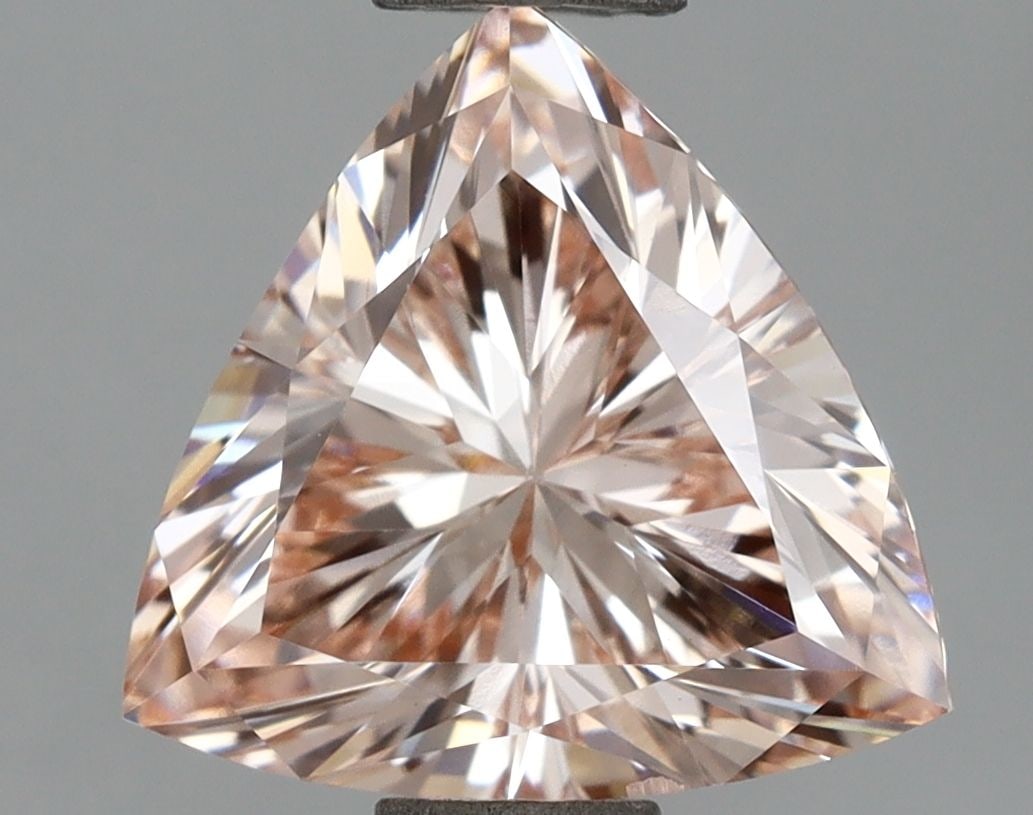 Loose Diamond - TRIANGULAR 1.5ct Fancy Pink VS2: Loose Diamond - TRIANGULAR 1.5ct Fancy Pink VS2 Source: This is a real non-mined Diamond that has been grown in a lab Shape: TRIANGULAR Carats: 1.5 Color: Fancy Pink Certification: IGI Video: