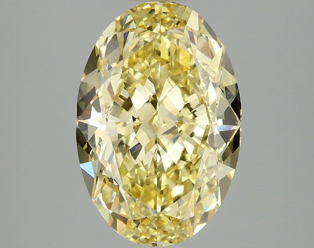 Loose Diamond - OVAL 4.06ct Fancy Vivid Yellow VS1: Loose Diamond - OVAL 4.06ct Fancy Vivid Yellow VS1 Source: This is a real non-mined Diamond that has been grown in a lab Shape: OVAL Carats: 4.06 Color: Fancy Vivid Yellow Certification: IGI Video: