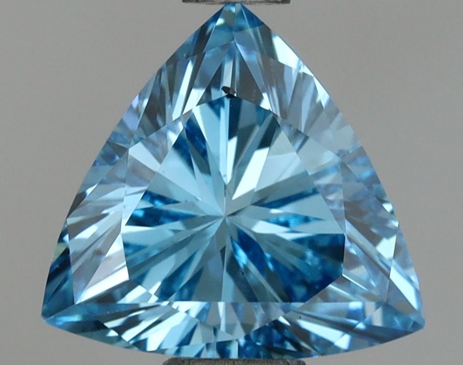 Loose Diamond - TRIANGULAR 1.04ct Fancy Vivid Blue VS2: Loose Diamond - TRIANGULAR 1.04ct Fancy Vivid Blue VS2 Source: This is a real non-mined Diamond that has been grown in a lab Shape: TRIANGULAR Carats: 1.04 Color: Fancy Vivid Blue Certification: IGI V