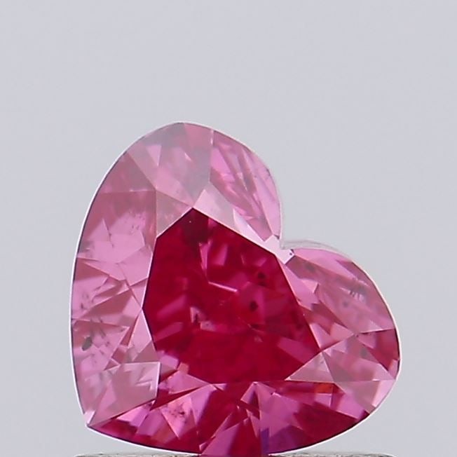 Loose Diamond - HEART 0.81ct Fancy Vivid Pink SI1: Loose Diamond - HEART 0.81ct Fancy Vivid Pink SI1 Source: This is a real non-mined Diamond that has been grown in a lab Shape: HEART Carats: 0.81 Color: Fancy Vivid Pink Certification: IGI Video:
