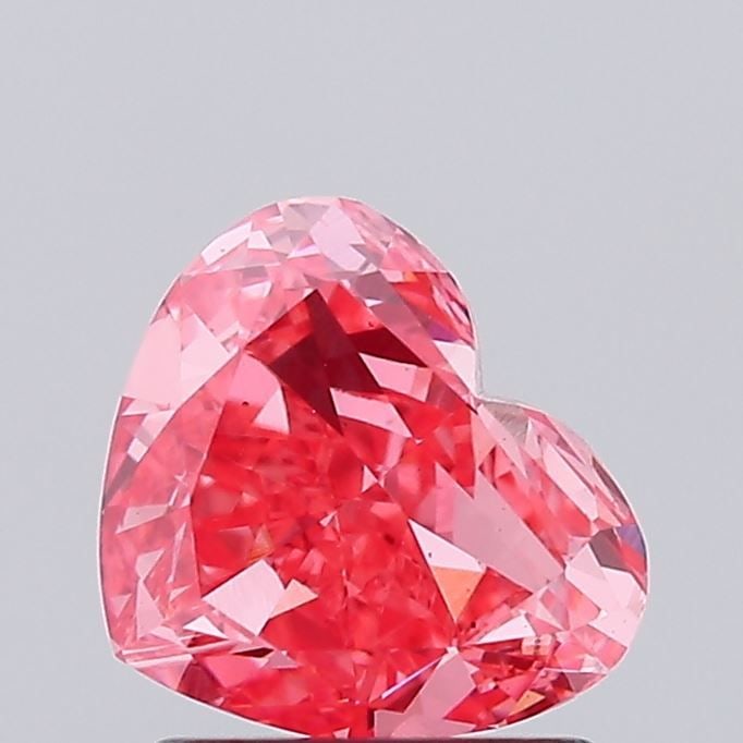 Loose Diamond - HEART 1.34ct Fancy Vivid Pink VS1: Loose Diamond - HEART 1.34ct Fancy Vivid Pink VS1 Source: This is a real non-mined Diamond that has been grown in a lab Shape: HEART Carats: 1.34 Color: Fancy Vivid Pink Certification: IGI Video:
