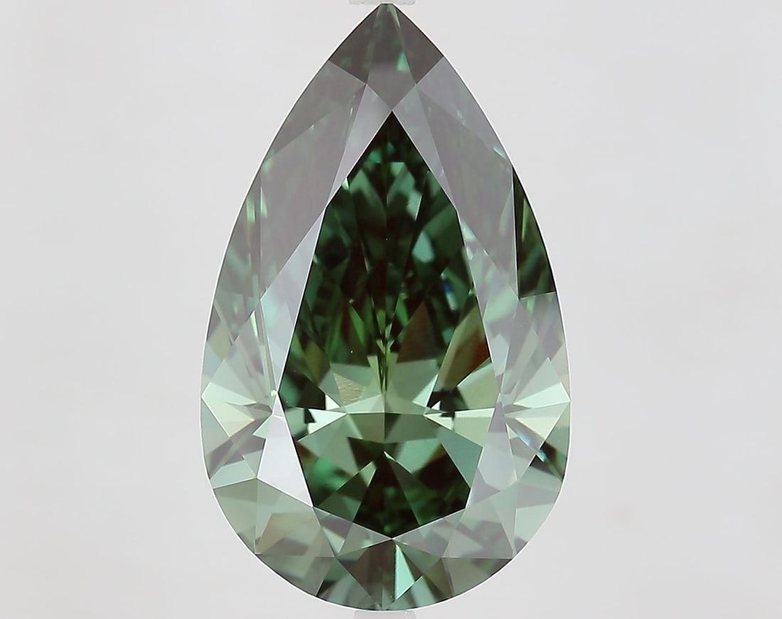 Loose Diamond - PEAR 9.01ct Fancy Vivid Green VVS2: Loose Diamond - PEAR 9.01ct Fancy Vivid Green VVS2 Source: This is a real non-mined Diamond that has been grown in a lab Shape: PEAR Carats: 9.01 Color: Fancy Vivid Green Certification: IGI Video: