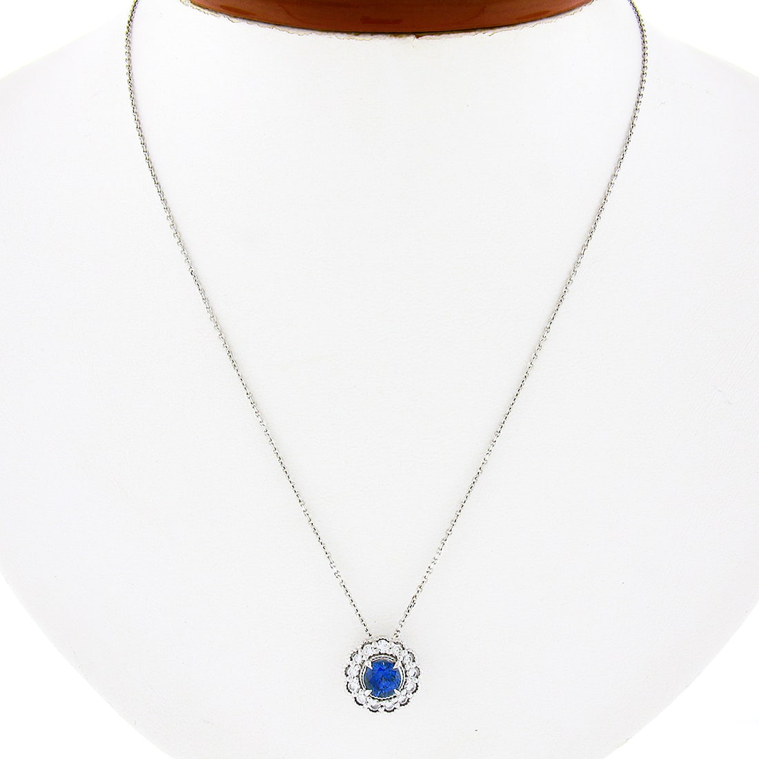 14K White Gold Sapphire Diamond Halo Pendant Necklace 1.48ctw Milgrain 18" Chain: 14K White Gold Sapphire Diamond Halo Pendant Necklace 1.48ctw Milgrain 18" Chain This exquisite pendant necklace is crafted in solid 14K white gold and features a stunning round brilliant cut sapphire